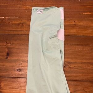 Ollie swaddle - light green - gently used